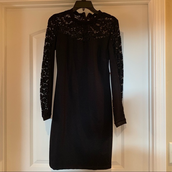 mid length black dress with sleeves